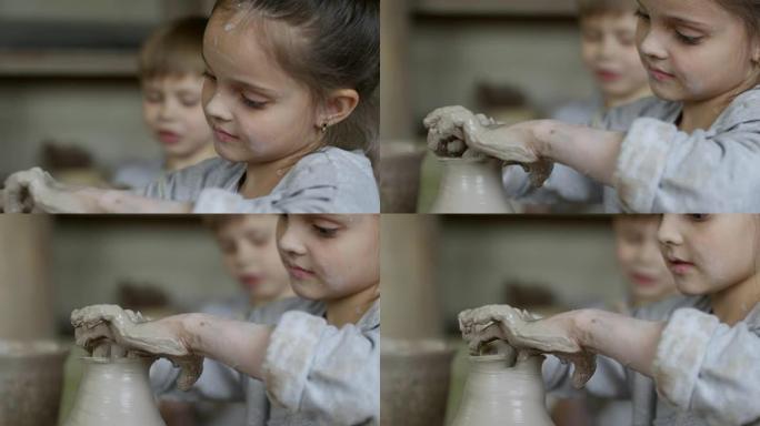 陶瓷课上做陶器的可爱女孩