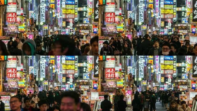 日本新宿东京市，歌舞伎町夜间的4k时间流逝，人群不明的人走在街上，交通拥挤。日本文化与购物霓虹灯街概