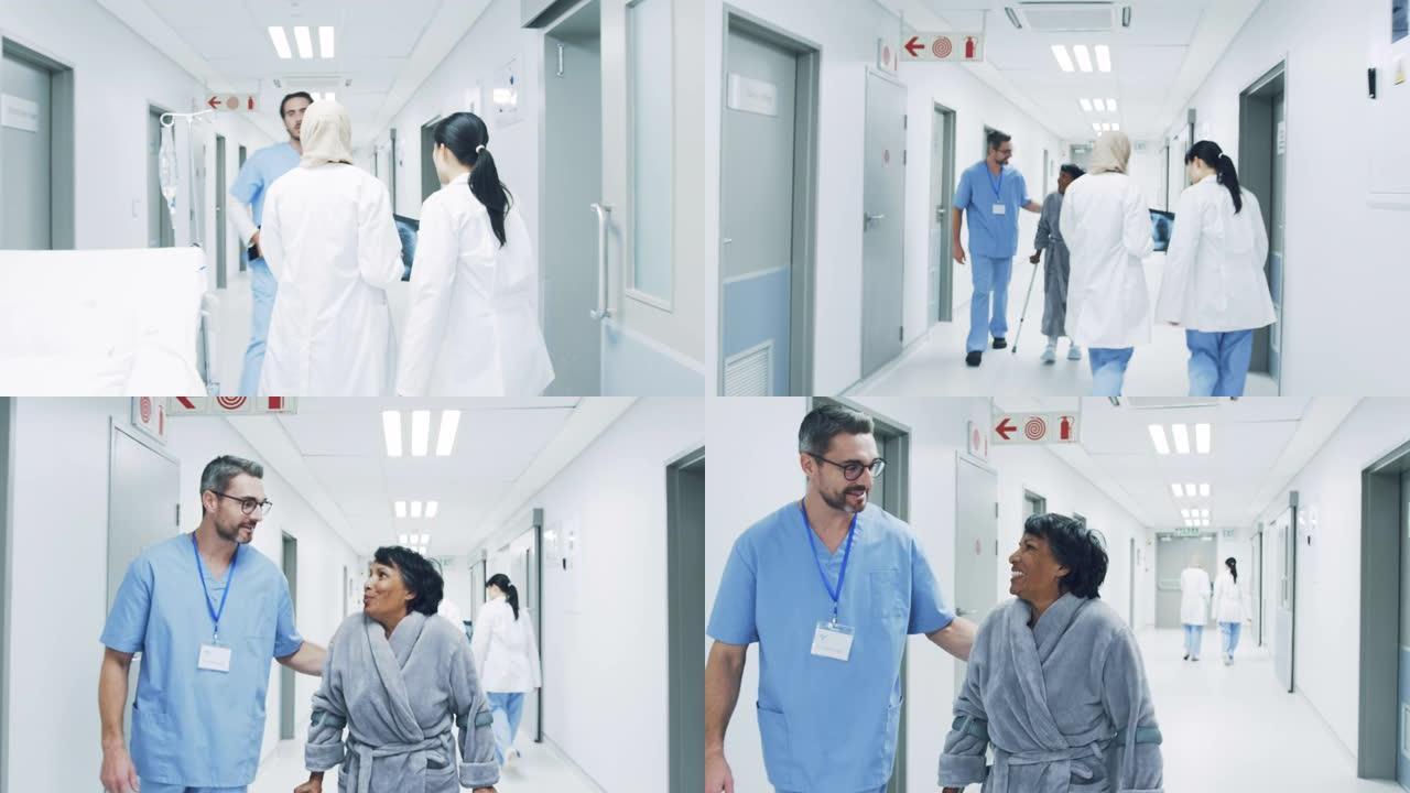 医院走廊的医生通过医护人员帮助老年患者4k