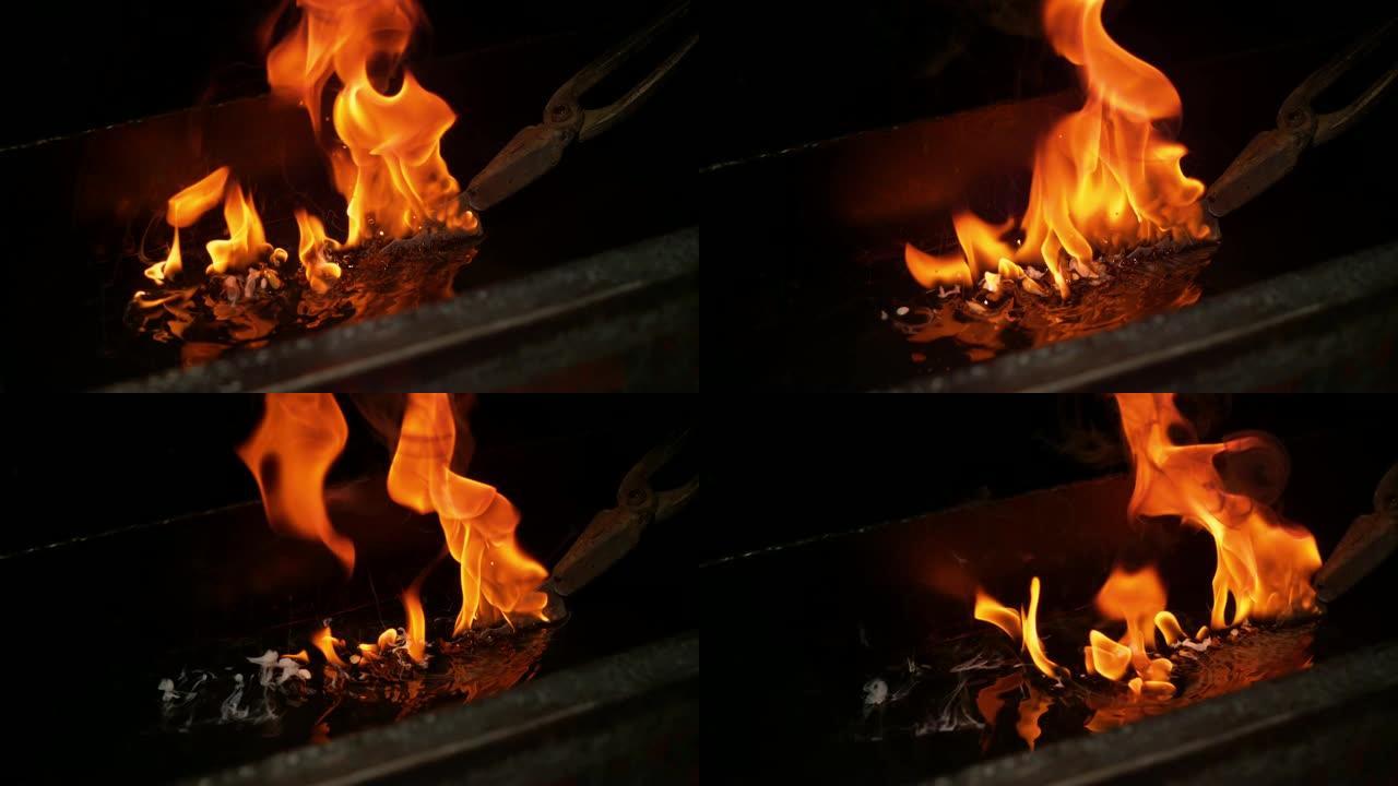 宏观，DOF: 在回火过程中燃烧的刀片浸入油中