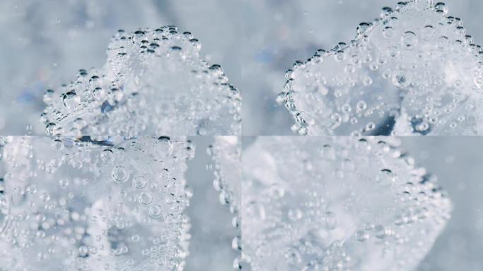 慢动作的冰块，将飞溅的冰块浸入冷的淡水中。