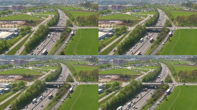 无人机: 无数车辆在现代城市附近的高速公路上形成交通堵塞。