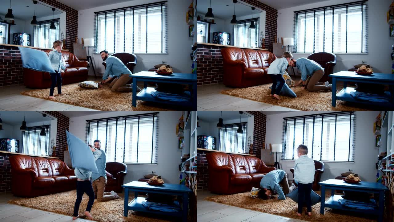 开朗的年轻欧洲父亲和小可爱儿子在现代灯光屋慢动作中玩耍，战斗枕头。