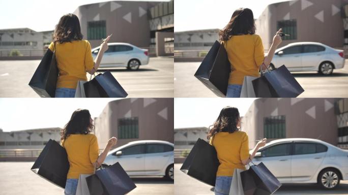 亚洲女性购物时带着购物袋散步