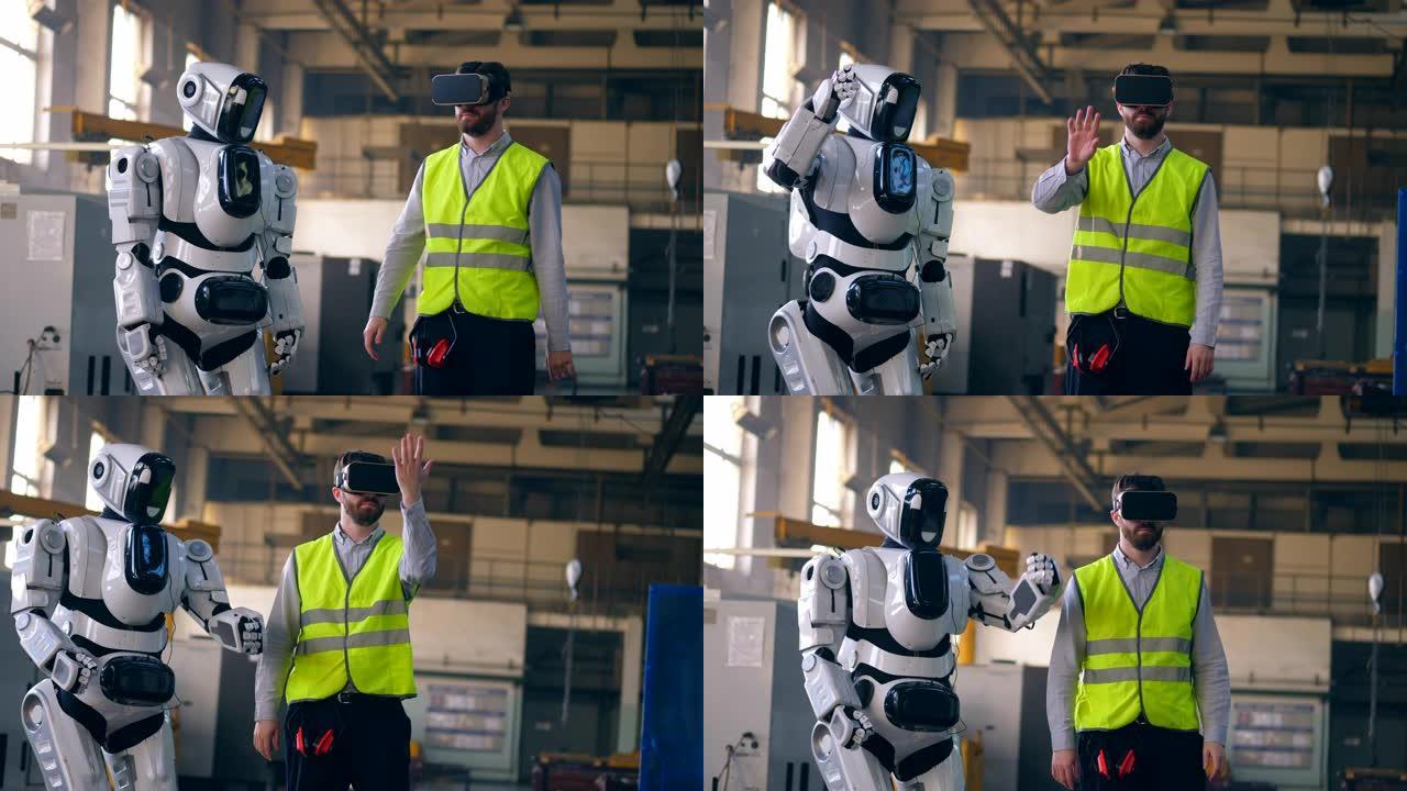 VR眼镜和机器人重复他的动作的技术人员