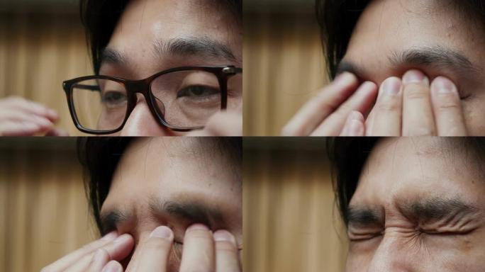 4k亚洲男子感到疲倦和眼睛疼痛的镜头