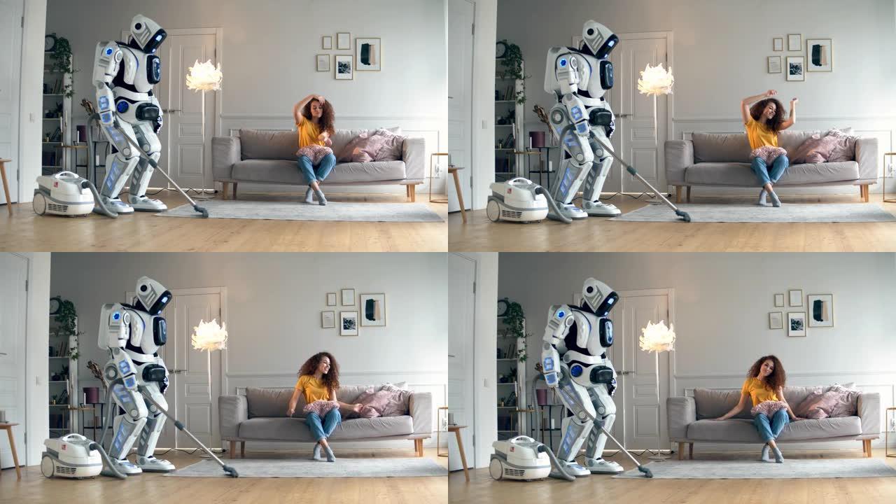 机器人真空清洁时，女孩跳舞。
