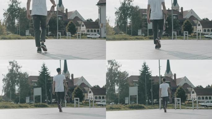 MS Tracking在阳光明媚的城市广场拍摄了年轻人的滑板