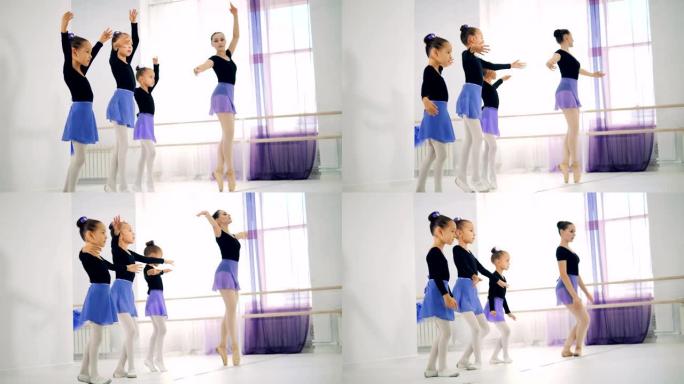 一群小女孩正在和一位女老师一起学习芭蕾舞