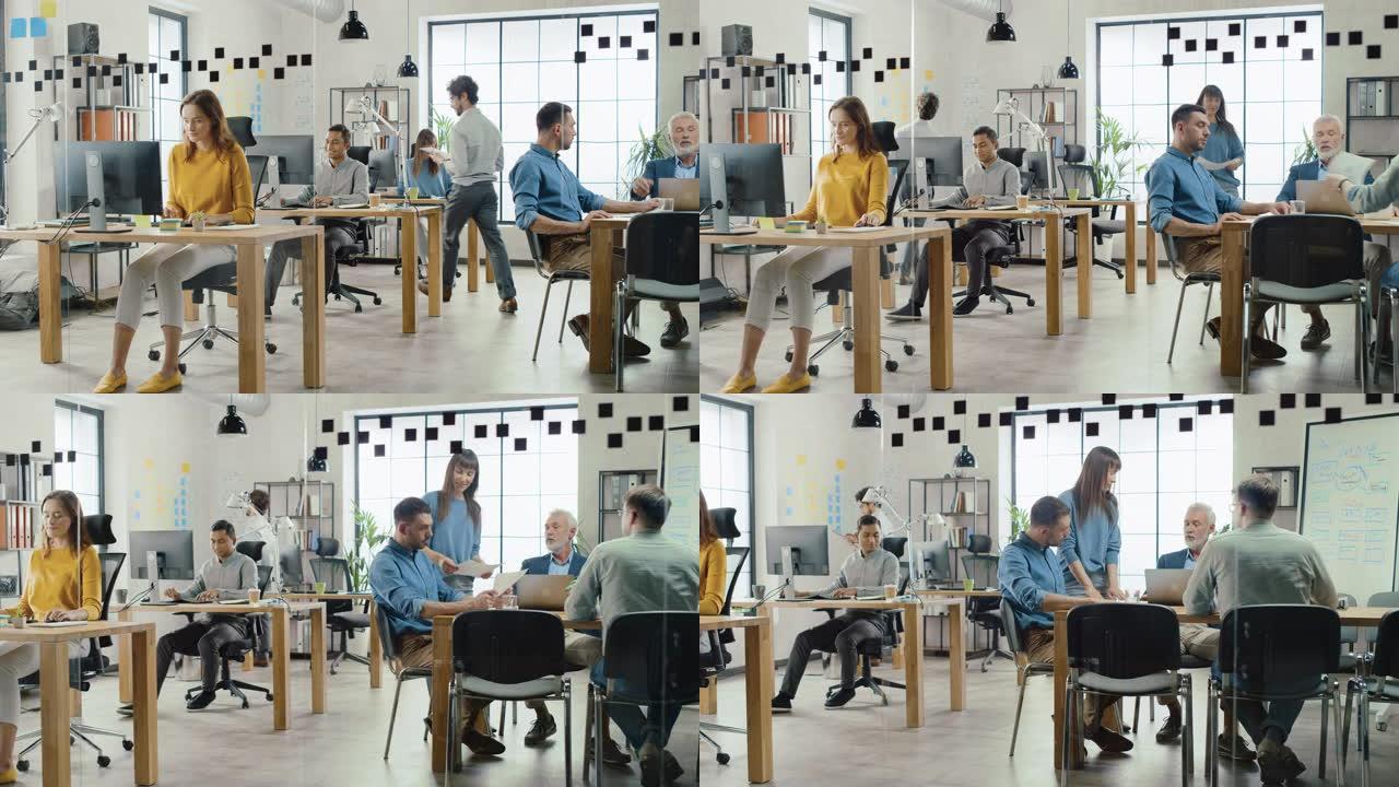 在时尚的开放空间办公室: 一群热情的商业营销专业人士使用电脑，开会，讨论项目想法，集思广益创业公司战