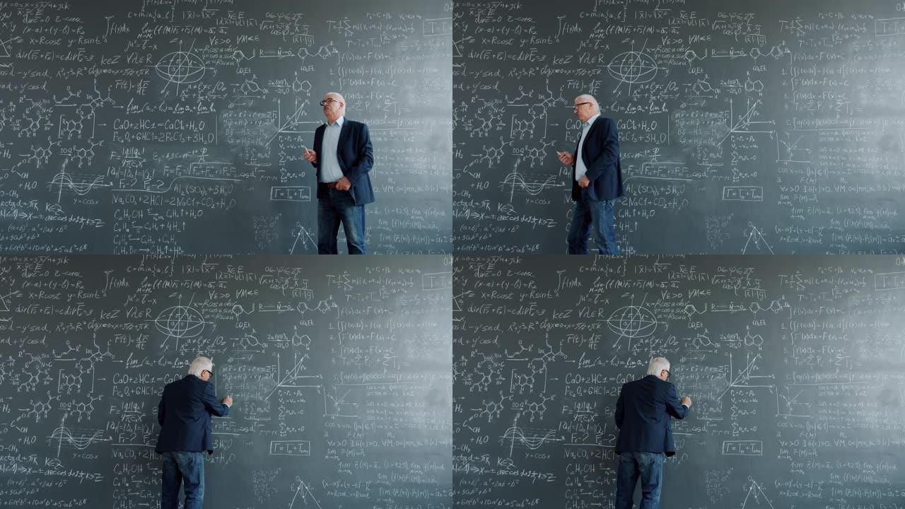 体贴的人走在黑板附近思考然后写公式寻找解决方案