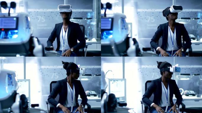 年轻的黑人女性虚拟现实工程师/戴着VR耳机的开发人员创建内容。她一个人在现代化的实验室/研究中心。