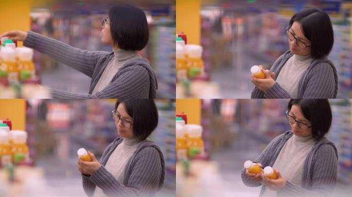 亚洲孕妇在超市购物的特写镜头