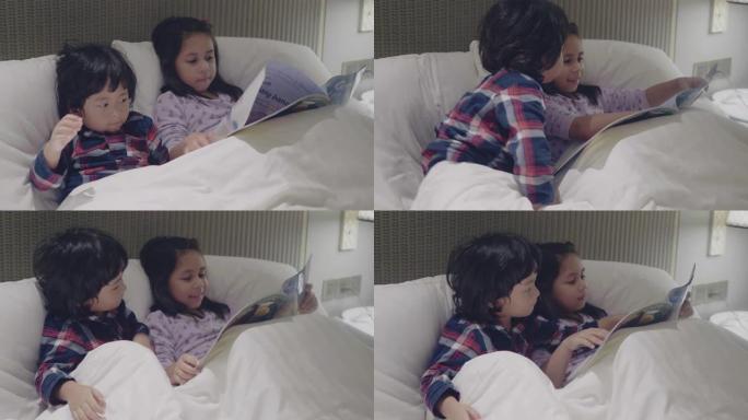 大姐姐在公寓里给小男孩读童话
