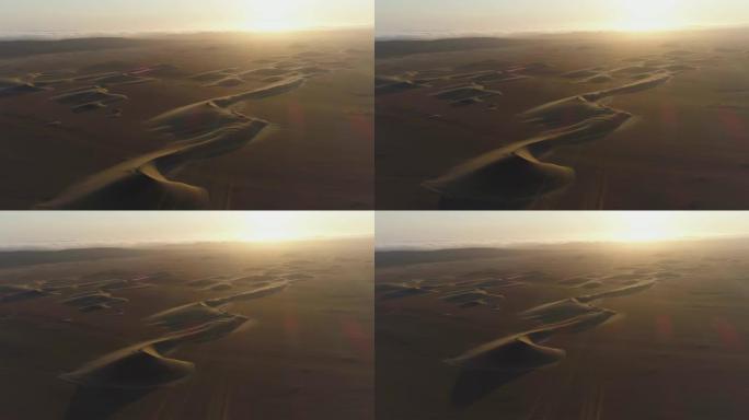 4k空中日落缩小纳米比亚骨架海岸纳米布沙漠美丽沙丘的景色