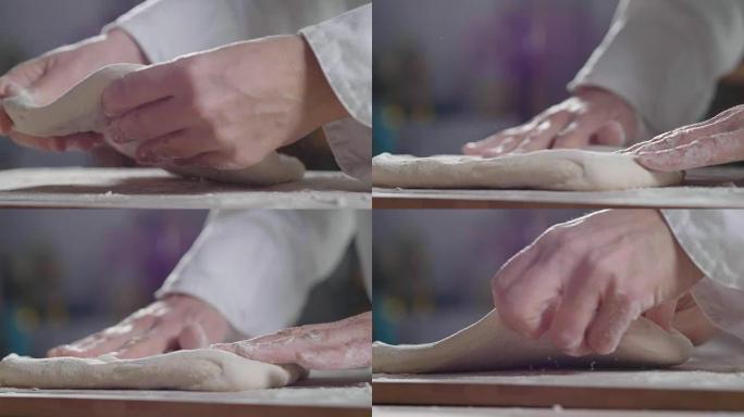 农民的手拿着一把黄色面粉，感受原材料的质量和精髓。