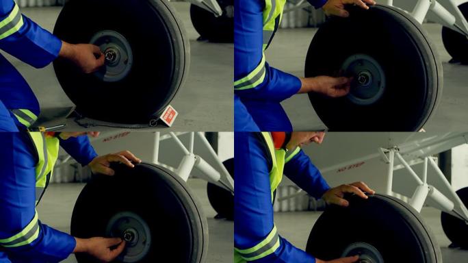 工程师修理飞机4k的轮子