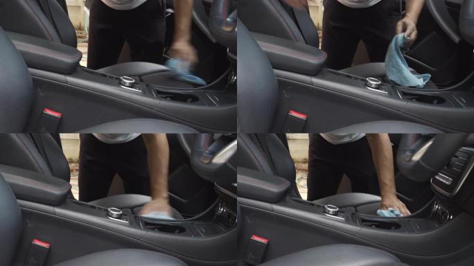 4k分辨率亚洲男子使用超细纤维擦拭清洁汽车座椅和汽车控制台