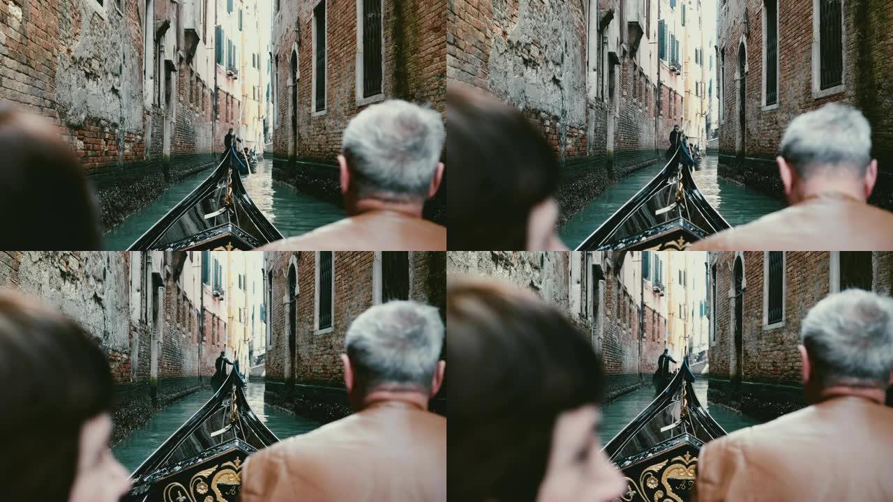 退休旅行期间，意大利非常狭窄的威尼斯运河上的贡多拉游览中的高级男女的背景图。