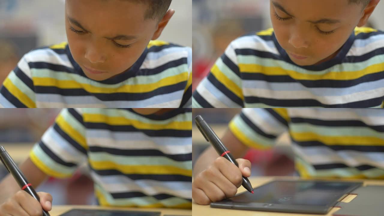 男孩在课堂上画画