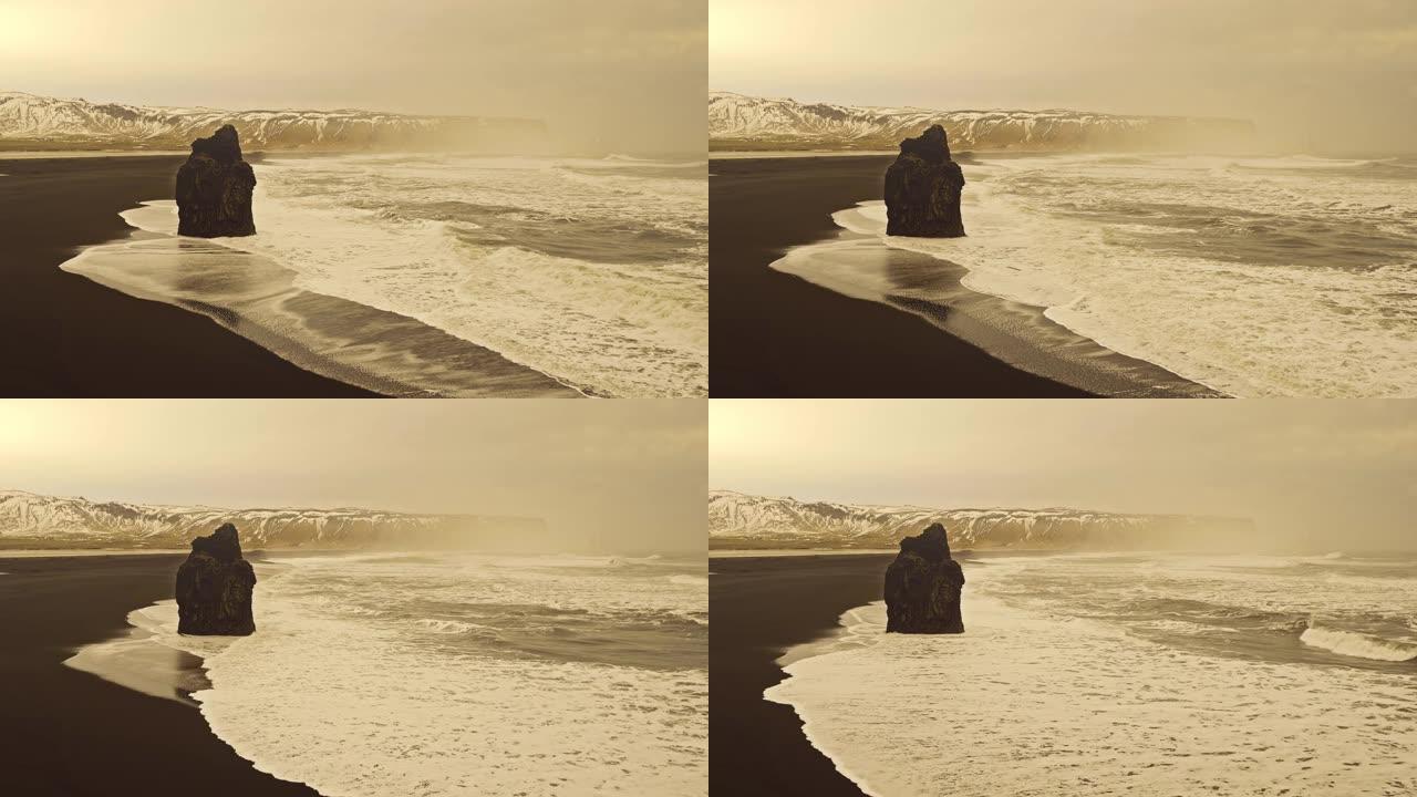 冰岛维克日落时黑沙雷尼斯法拉海滩的慢动作视频
