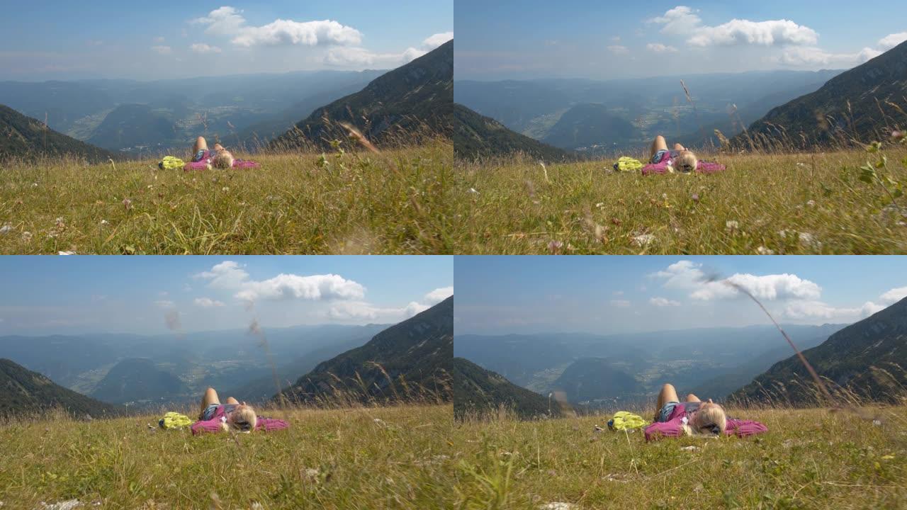 SLO MO女人躺在山上