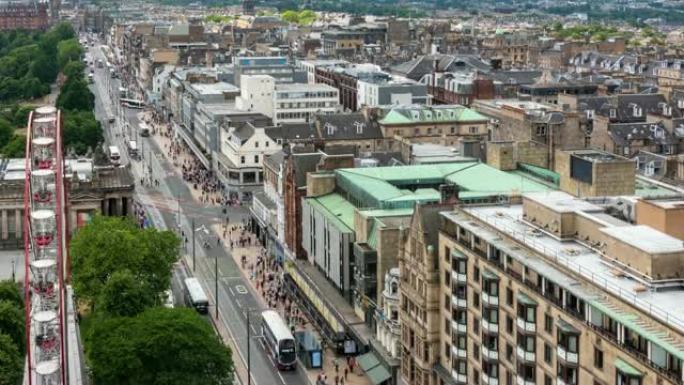 英国爱丁堡苏格兰游客拥挤的王子购物街的空中延时