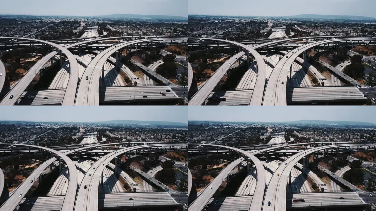 大型复杂公路路口的静态无人机航拍，汽车穿过多个天桥和桥梁。