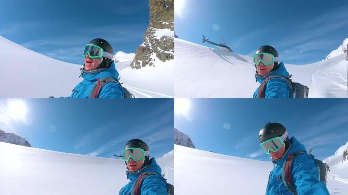 自拍镜头耀斑: 激动的滑雪者向直升机发出沙卡标志。