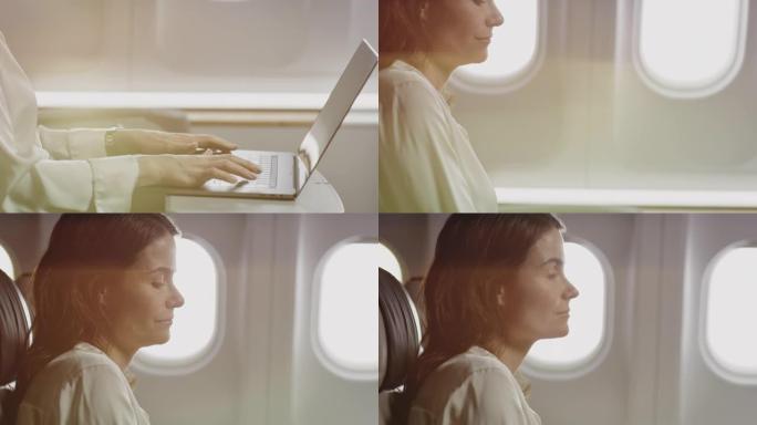 女商人在私人飞机上的笔记本电脑上打字