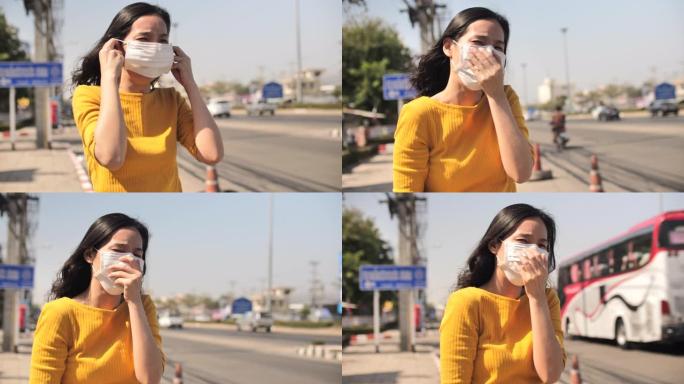 曼谷空气污染妇女与面罩保护