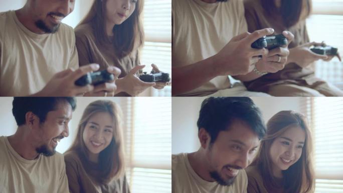 时髦的亚洲男人和年轻的亚洲女人拿着操纵杆在家卧室玩游戏。