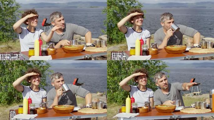 夫妇在野餐时喝茶聊天