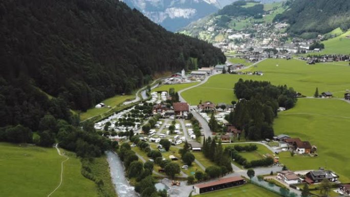 令人惊叹的空中拍摄美丽的高山露营地和瑞士阿尔卑斯山英格堡山脚下的河流。