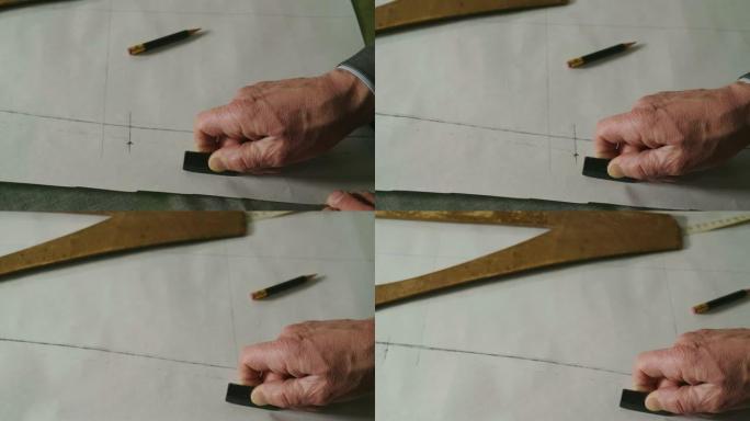 裁缝根据裁缝的传统绘制和切割布料。裁缝师使用完美的针和线来缝制传统概念，
