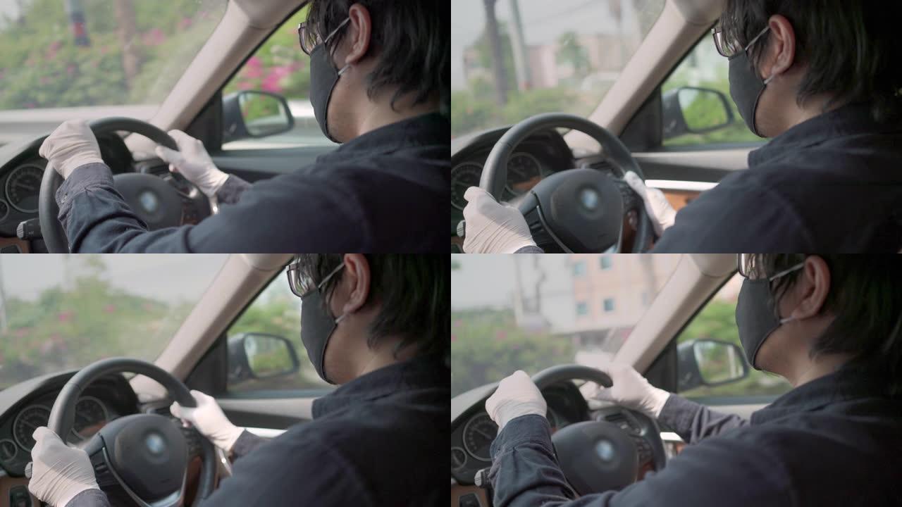 出租车司机在开车时戴防护面罩和塑料手套
