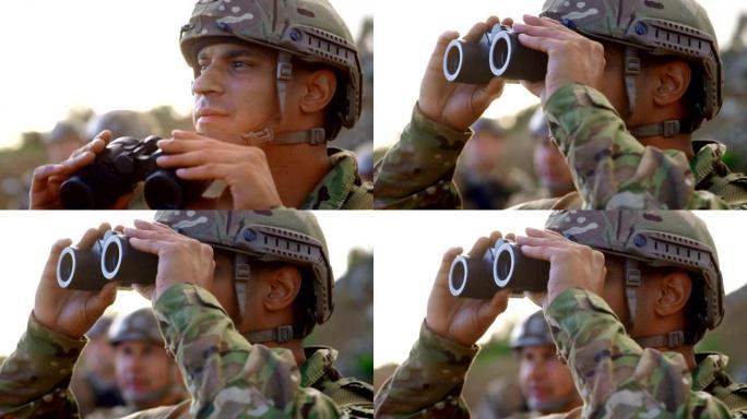 年轻的高加索军事士兵在军事训练4k时在野外观察的侧视图