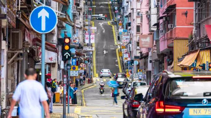 香港东街区附近有无法辨认的行人步行和巴士的4k延时人群