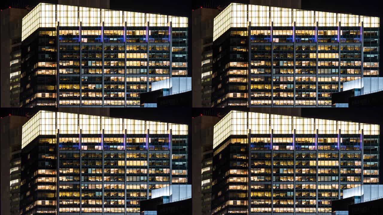 美国波士顿市延时办公室窗口之夜，以实现后期工作概念