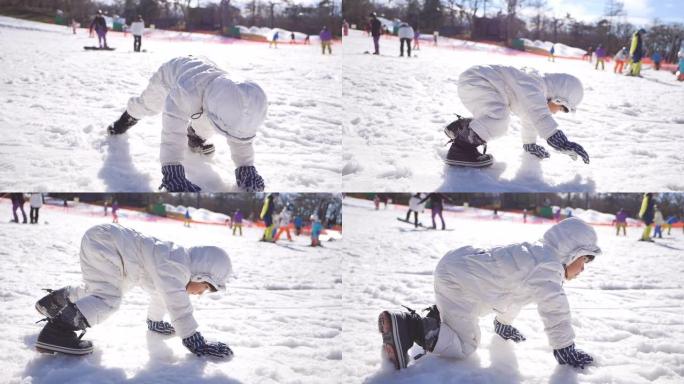 旅游妇女和儿童在雪地里玩耍
