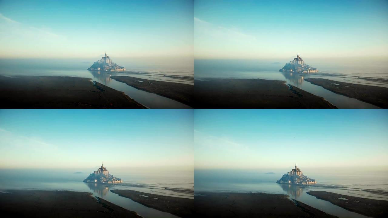 大气电影空中拍摄的大雾日出圣米歇尔山涨潮，诺曼底著名的岛屿要塞。