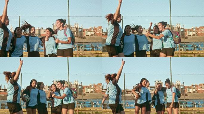 快乐的年轻女足球运动员庆祝成功的慢动作视频