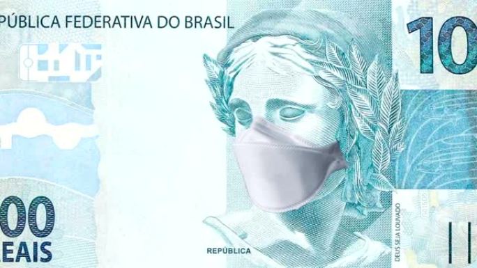 一百雷亚尔账单，配有一次性医用口罩。巴西冠状病毒流行病的概念。冠状病毒大流行对巴西经济的影响
