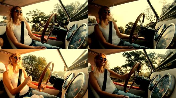戴着金色头发的太阳镜微笑的女人开车