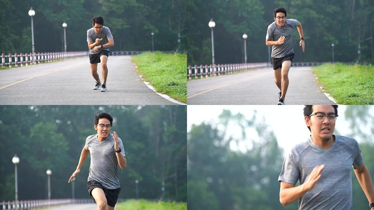 SLO MO亚洲男子在跑步中进行速度训练练习