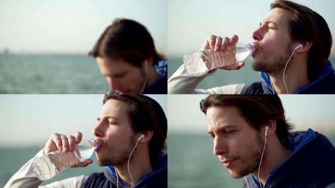 口渴的运动员正在喝水