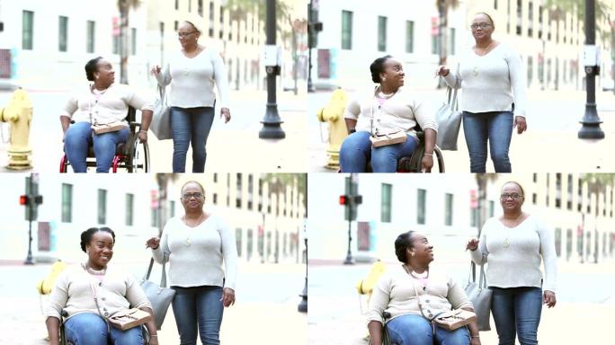 在城市街道上与资深母亲坐轮椅的女人