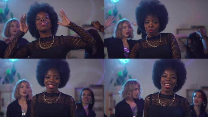 美丽的黑人女子在镜头前跳舞
