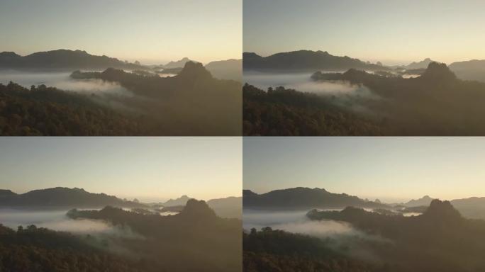 雾的鸟瞰图流过泰国北部的雨林山