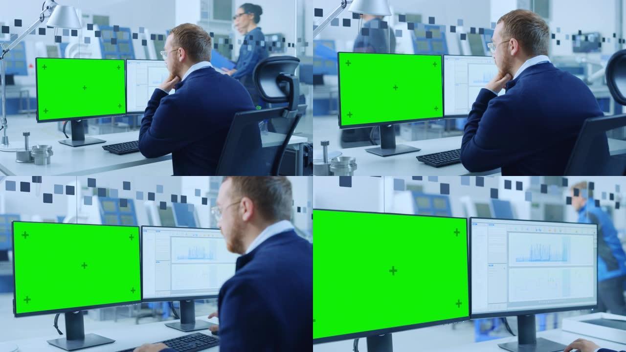 工业工程师在个人计算机上工作，两台显示器显示绿屏显示和cad软件，并测试了3D Eco引擎。现代工厂